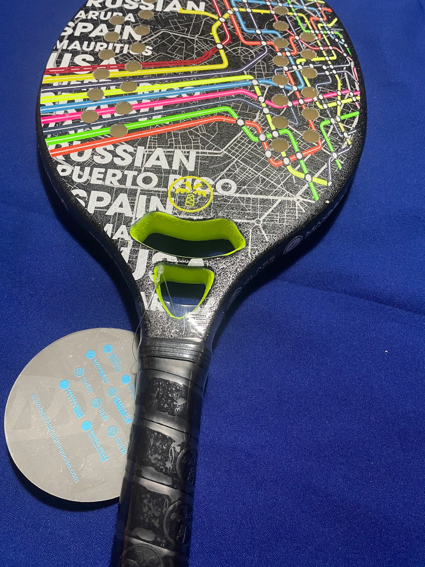 Turquoise Beach Tennis Racket Concept
