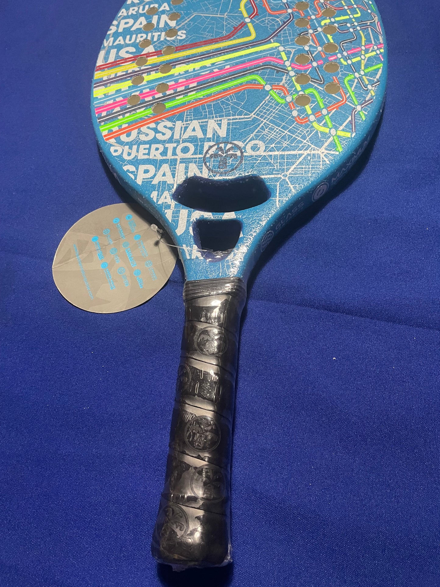 Turquoise Beach Tennis Racket Concept